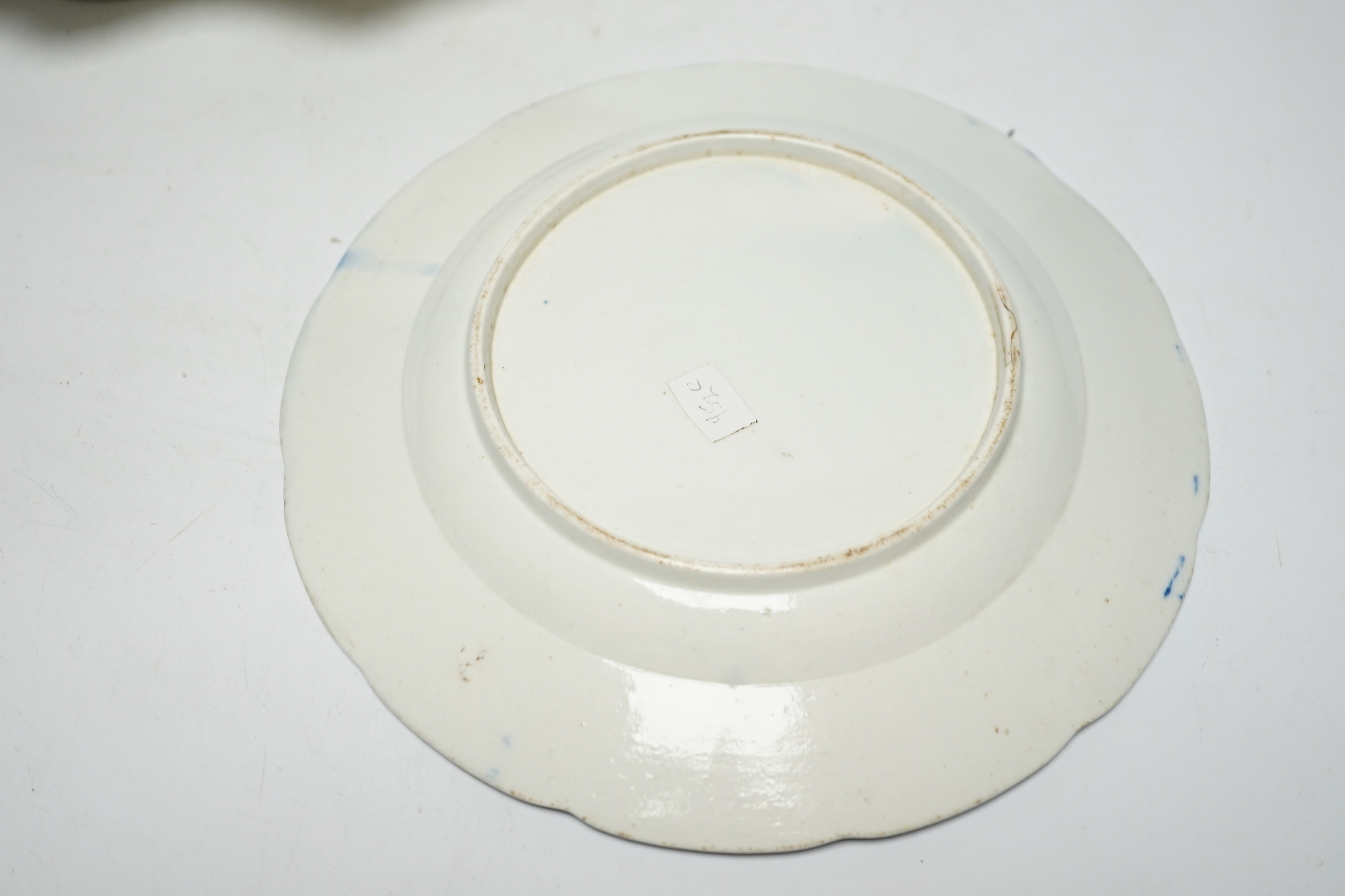 A Caughley carnation pattern plate, c.1765-70 and a fisherman pattern dessert dish c.1780, plate 21.5cm